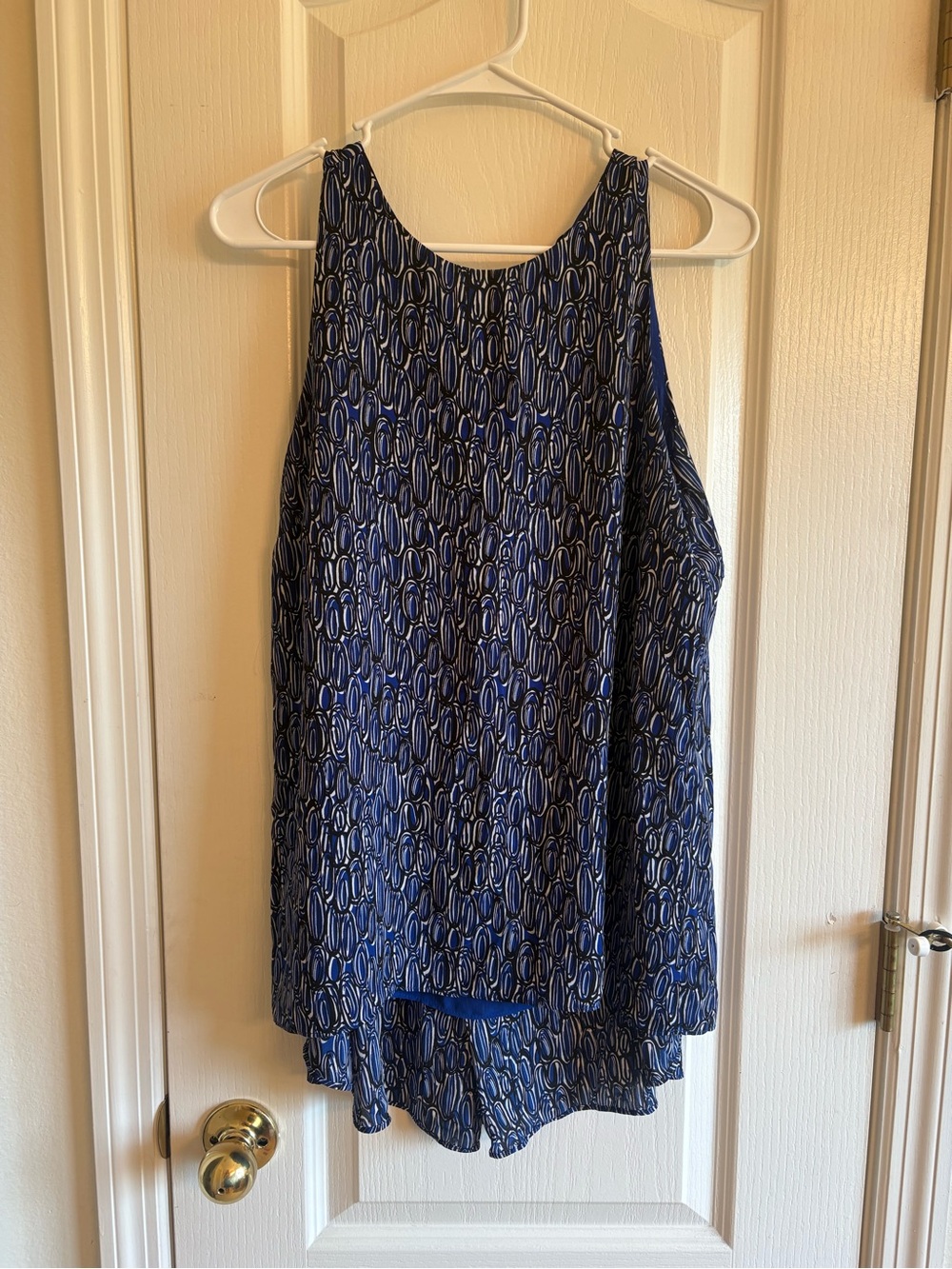 Vince Camuto high low top Blue Patterned Sleeveless blouse